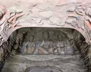 PXL_20241025_025040446 The right cave has a front and back chambers. The main chamber is horizontal rectangular shape. The sculptures in the cave show the mixed style of both Han...