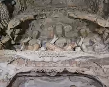 PXL_20241025_025113389 The right cave has a front and back chambers. The main chamber is horizontal rectangular shape. The sculptures in the cave show the mixed style of both Han...