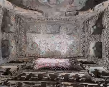 PXL_20241025_025117023 The right cave has a front and back chambers. The main chamber is horizontal rectangular shape. The sculptures in the cave show the mixed style of both Han...