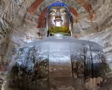 PXL_20241025_024441283 Cave of the Great Buddha. Outside Wooden structures: 1651. Two luxuriant holy trees are carved on the sides of the entrance and two Buddhas seat under the...