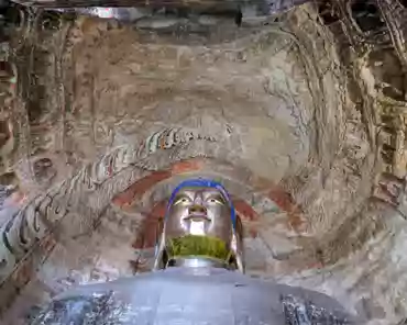 PXL_20241025_024503411 Cave of the Great Buddha. Outside Wooden structures: 1651. Two luxuriant holy trees are carved on the sides of the entrance and two Buddhas seat under the...