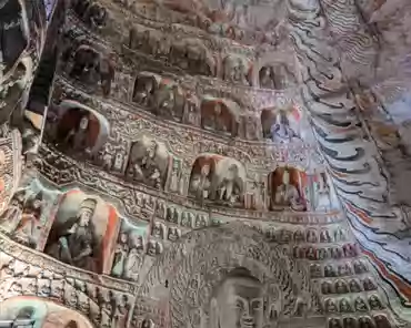 PXL_20241025_024519069 Cave of the Great Buddha. Outside Wooden structures: 1651. Two luxuriant holy trees are carved on the sides of the entrance and two Buddhas seat under the...