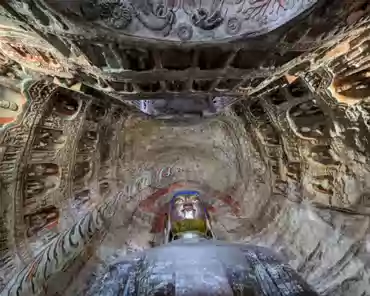 PXL_20241025_024601996 Cave of the Great Buddha. Outside Wooden structures: 1651. Two luxuriant holy trees are carved on the sides of the entrance and two Buddhas seat under the...