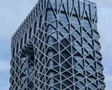 PXL_20241109_043658114 Morpheus hotel by Zaha Hadid architects, 160m tall, 772 rooms, 2019. The aluminum exoskeleton removes the need for any internal column.