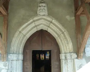 P1000775 Notre-Dame-de-l'Assomption church: 12th century portal.