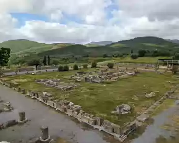 PXL_20240418_074422542 Sanctuary of Asclepios. 140 bases for bronze honorary statues of eminent citizens. The courtyard is surrounded by 4 double stoas. There are rooms and buildings...