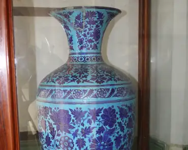 IMG_3705 Sind style open mouthed glazed decorative vase made in red clay on the wheel with copper blue ground and cobalt blue floral ornamentation. Oval floral...